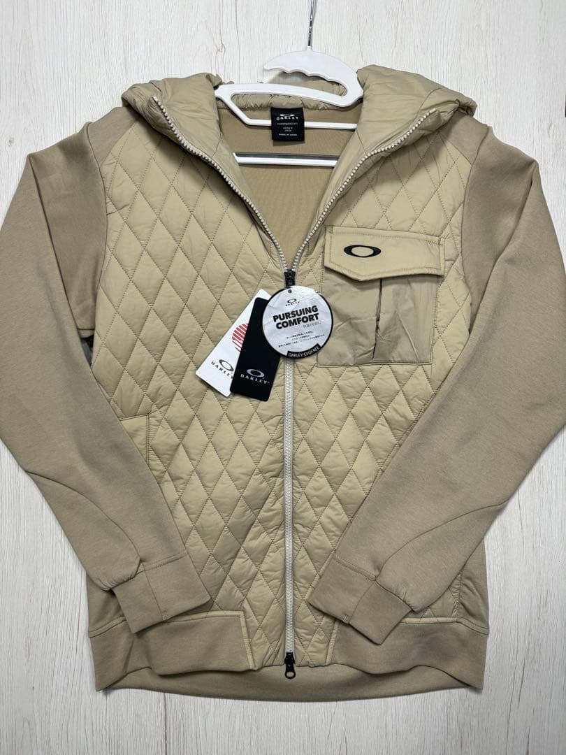 Oakley Hybrid Puff Fleece 8.0 ベージュ オークリー ゴルフウェア 長袖ウインドブレーカー 秋 冬 HYBRID PUFF
